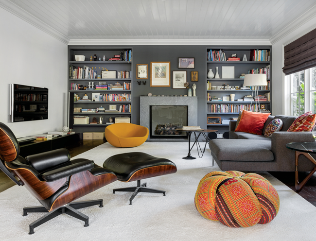 modern-living-room-with-eames-lounge-chair-and-orange-pouf