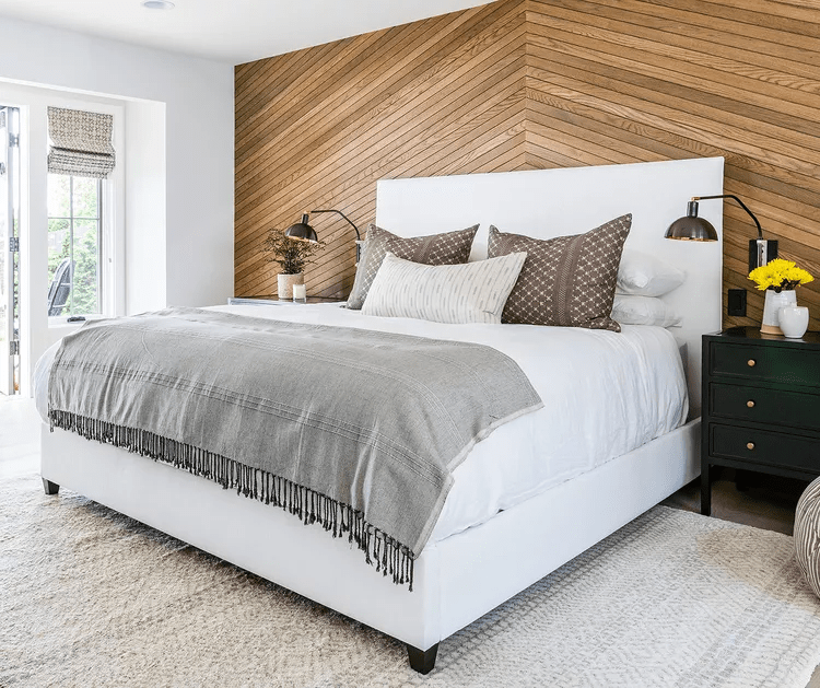 a-clean-modern-and-uncluttered-bedroom-with-a-warm-hardwood-floor-accent-wall