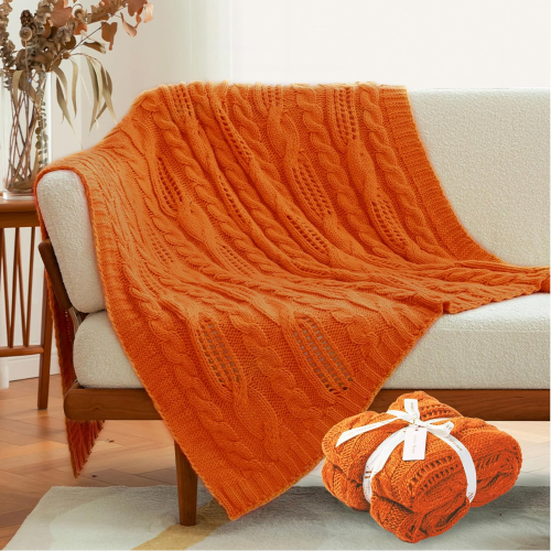Cozy-living-room-with-fall-themed-orange-throw-blanket