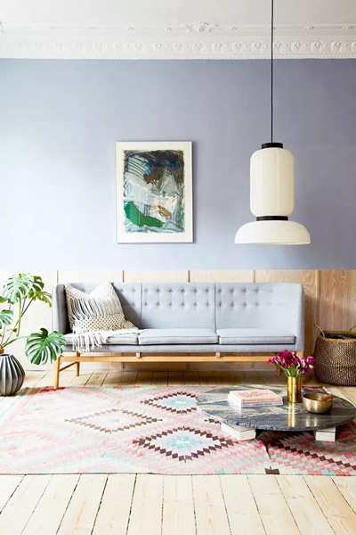 A-modern-living-room-with-a-minimalist-white-couch-and-pops-of-color-adding-vibrancy-without-overwhelming-the-space