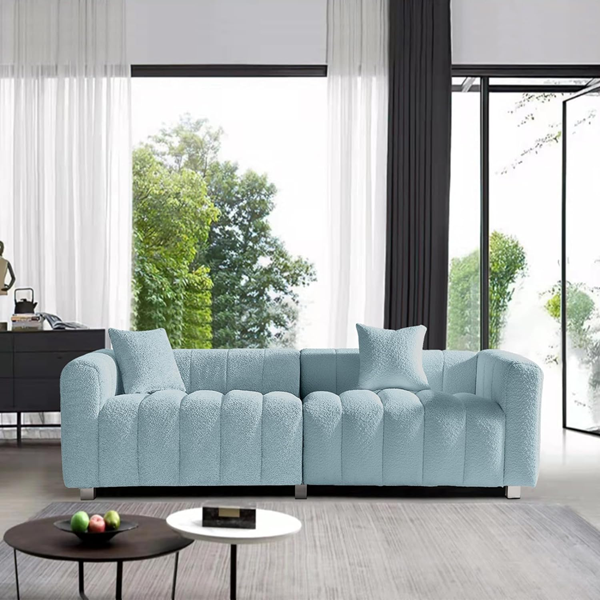 modern-living-room-with-large-windows-and-pale-blue-moden-couch