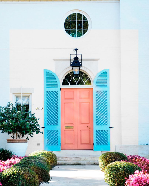 how-to-pick-a-front-door-color-with-a-rich-coral-color-and-blue-shetters