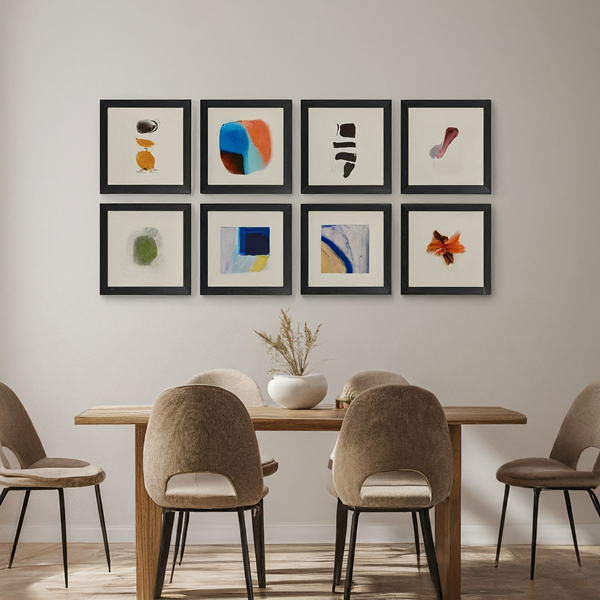 A Nordic dining room gallery wall in a grid style.