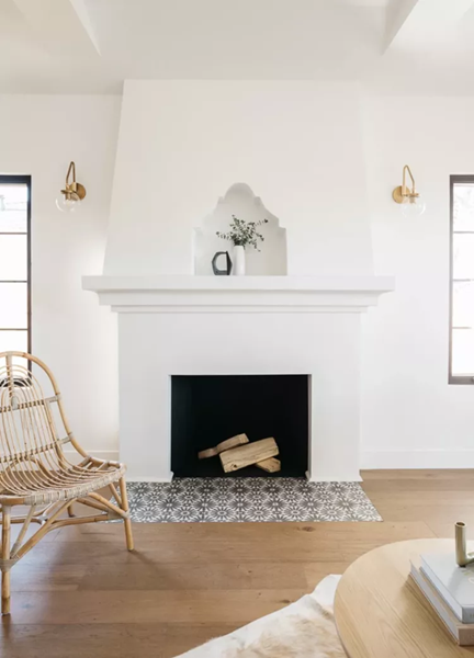 Fireplace-in-a-modern-living-room-with-wall-sconces