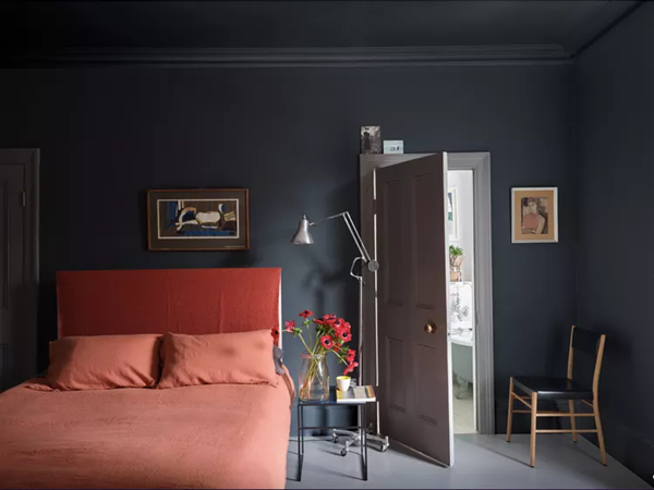 all-black-paint-wall-bedroom-with-red-bed