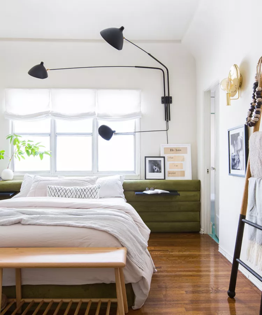 a-contemporary-bedroom-with-a-Nordic-with-a-long-arm-wall-light
