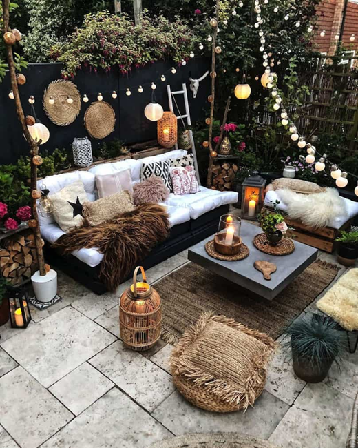 a-cozy-bohemian-patio-with-soft-textures-and-layers-of-lighting