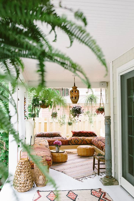 bohemian-patio-with-benches-covered-in-kilim-cushions