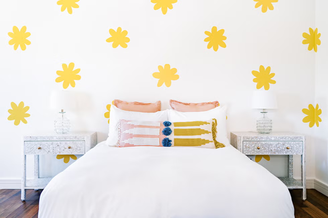 mural-accent-wall-in-a-yellow-bright-room